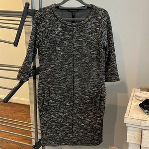 Banana Republic grey and black. Great for offices with AC! AND it has pockets!